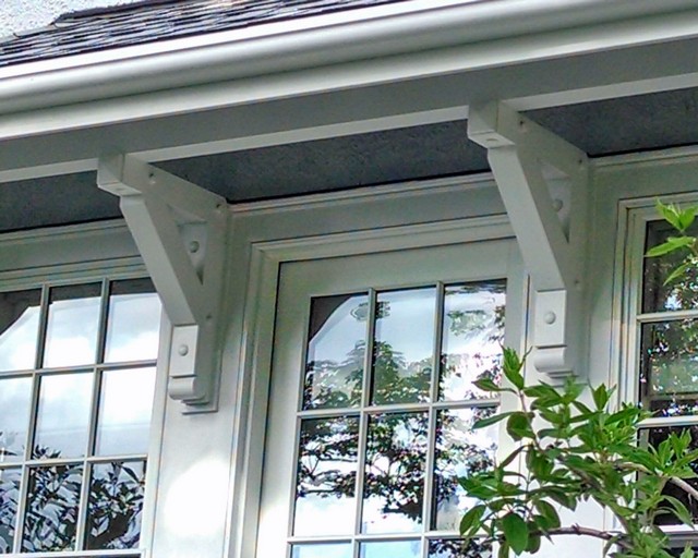 Painted heavy timber brackets & braces